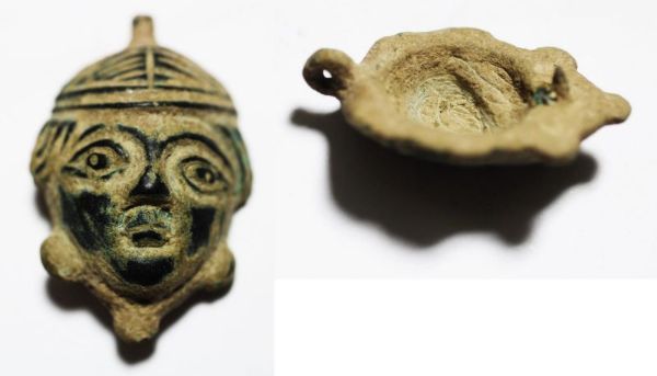 Picture of Ancient Rome, c. 1st-3rd century AD. Nice bronze oil lamp or incence burner lid depicting a face