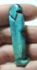 Picture of ANCIENT EGYPT. BEAUTIFUL SHINY BLUE COLOUR . TWO COLOUR HIGHLIGHTS, WIG HAS A DARKER COLOUR . 26TH DYNASTY. FAIENCE USHABTI. 600 - 300 B.C