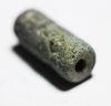 Picture of Iron Age I (c. 1200–1000 BC). Stone Cylinder seal. Canaanite-Cypriot style.