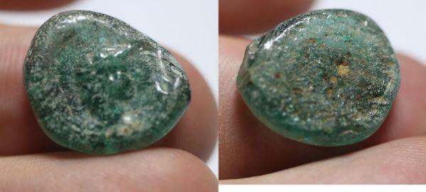 Picture of Roman Near East. Second-third century AD. Green glass tessera.