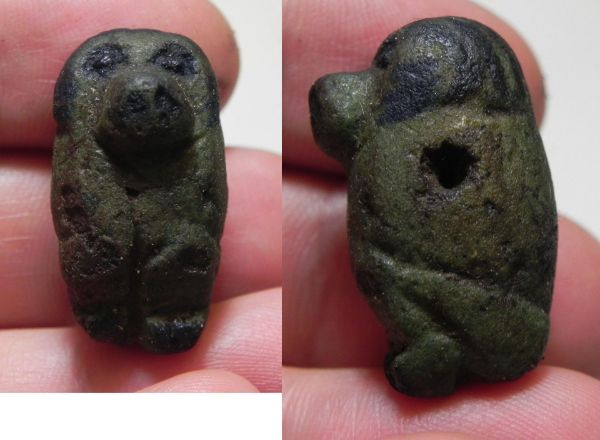 Picture of ANCIENT EGYPT, UNIQUE BABOON AMULET. 1292-1189 B.C. NEW KINGDOM. 19TH DYNASTY. GREEN WITH BLACK HIGHLIGHTS