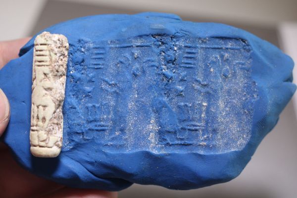 Picture of LATE BRONZE AGE. 1400 - 1200 B.C. FAIENCE CYLINDER SEAL.