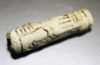 Picture of LATE BRONZE AGE. 1400 - 1200 B.C. FAIENCE CYLINDER SEAL.