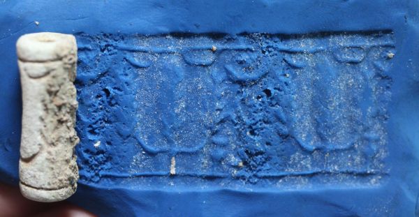 Picture of LATE BRONZE AGE. 1400 - 1200 B.C. FAIENCE CYLINDER SEAL.  