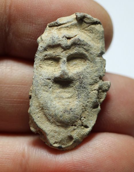 Picture of ANCIENT HELLENISTIC LEAD FRAGMENT WITH MALE FACE. 300 -100 B.C
