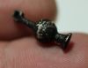 Picture of ANCIENT EGYPT , NEW KINGDOM ELECTRUM POPPY SEED AMULET.  1250 B.C