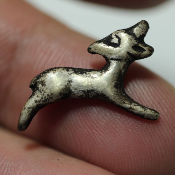 Picture of ANCIENT EGYPT , NEW KINGDOM SILVER IBEX AMULET.  1250 B.C