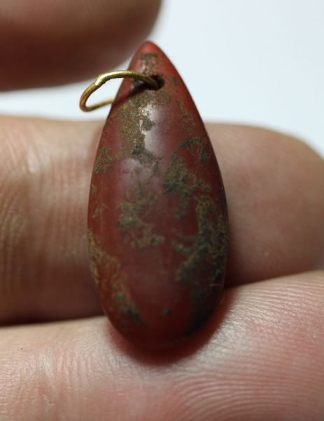 Picture of ANCIENT EGYPT , NEW KINGDOM STONE BEAD WITH THE ORIGINAL ANCIENT GOLD RING.  1250 B.C