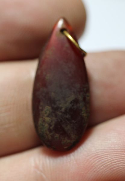 Picture of ANCIENT EGYPT , NEW KINGDOM STONE BEAD WITH THE ORIGINAL ANCIENT GOLD RING.  1250 B.C