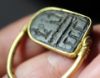 Picture of ANCIENT EGYPT.  NEW KINGDOM GOLD SWIVEL RING WITH BLACK STONE SEAL 1250 B.C