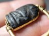 Picture of ANCIENT EGYPT.  NEW KINGDOM GOLD SWIVEL RING WITH BLACK STONE SEAL 1250 B.C