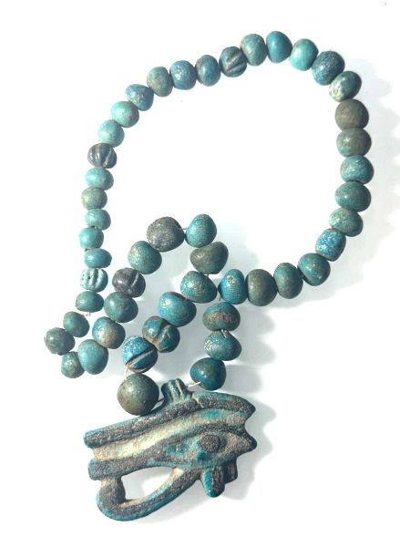 Picture of ANCIENT EGYPT.  FAIENCE EYE OF HORUS WITH FAIENCE BEADS.  ALL NEW KINGDOM 1350 - 1250  B.C